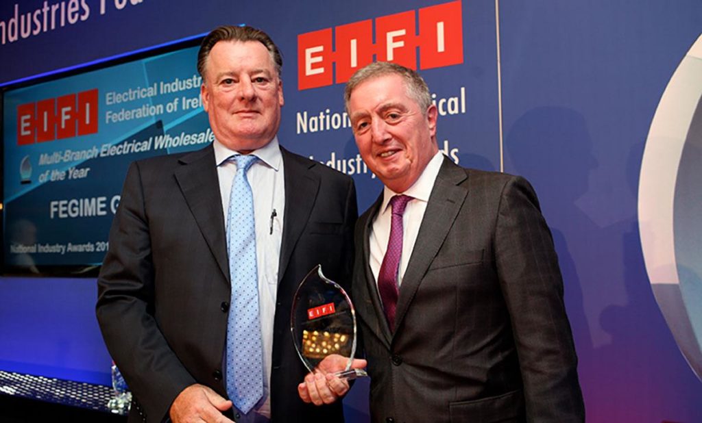 Fegime got the Best Multi-Branch Wholesaler Award at the EIFI Event. Peadar Conlon, President of Fegime Ireland receives the award from Ciaran O'Reilly of ATC